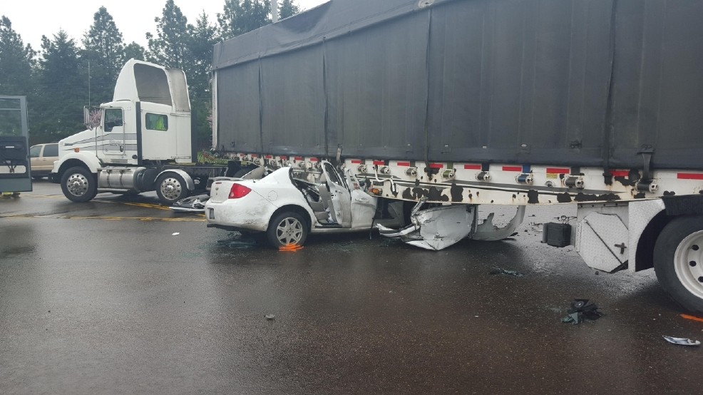Car and semi truck crash
